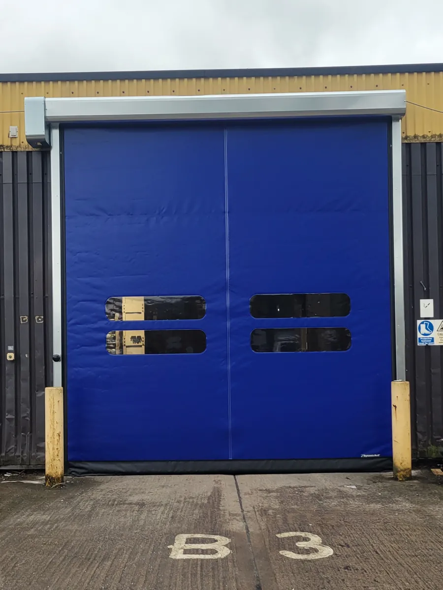 A blue high speed door on a loading bay